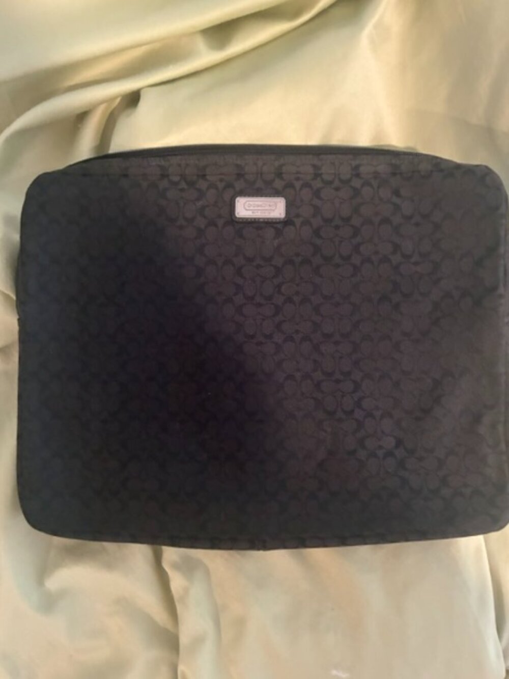 Beautiful Coach signature laptop bag. Measures 15 X 12 X 2.5